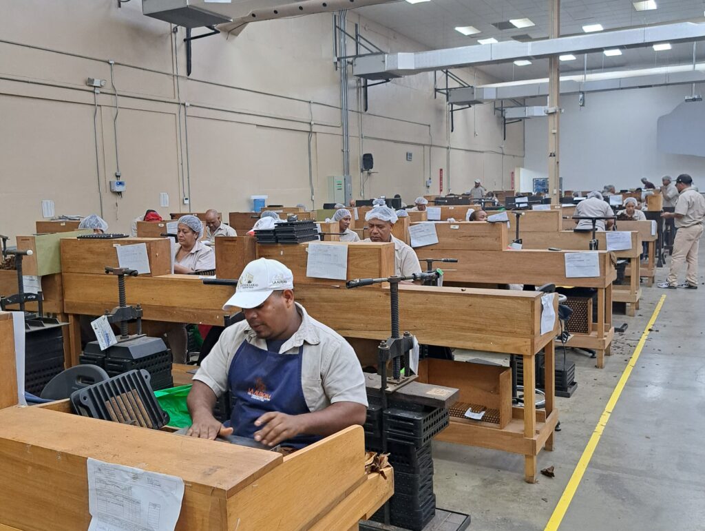 Cigar Rollers rolling at the La Aurora factory